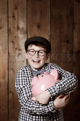 Buy stock photo Piggy bank, hug and portrait of boy child with savings, growth or investment success in his home. Finance, learning and face of excited kid with money box for future education, funding or security
