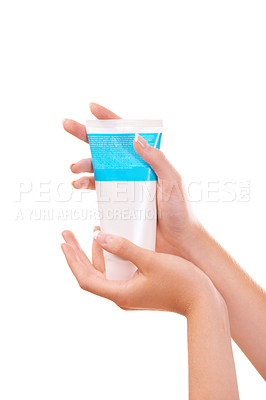 Buy stock photo Woman, hands and skincare product for beauty, cosmetics or sunscreen against a white studio background. Closeup of female person with container of cream, SPF or anti aging in soft skin or moisturizer