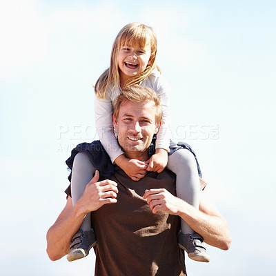 Buy stock photo A young father carrying his smiling daughter on his shoulders