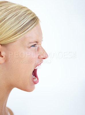 Buy stock photo Angry face, profile or woman screaming in studio at mockup space for crisis, mad emoji or reaction on white background. Frustrated model, voice and shouting loud in anger, negative expression or rage