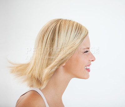 Buy stock photo Profile of a pretty young woman smiling 