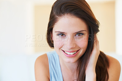 Buy stock photo A naturally beautiful young woman smiling at you