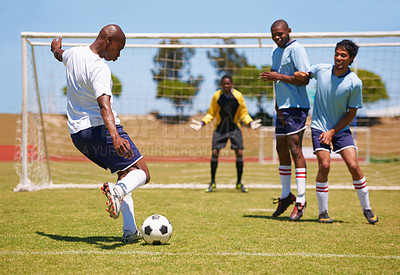 Buy stock photo An attacker taking a free-kick during a soccer match