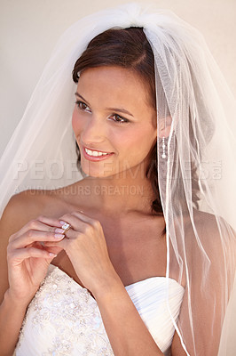 Buy stock photo Woman, wedding dress and ring for marriage ceremony or commitment celebration, partnership union or diamond jewelry. Female person, bride and veil or elegant accessory for romance, love or promise