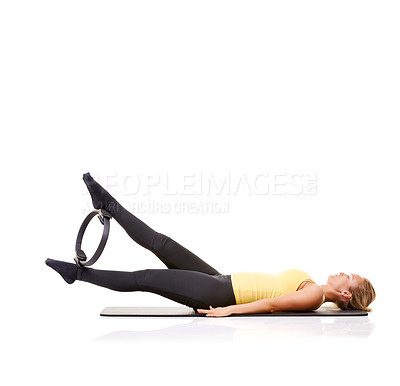 Buy stock photo Pilates ring, legs and woman training in studio isolated on a white background mockup space. Exercise, person on mat and yoga circle for feet, balance and fitness for healthy body workout on floor