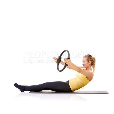 Buy stock photo Woman, pilates ring and yoga mat for balance exercise or resistance training, strong core or studio white background. Female person, equipment for muscle wellbeing or abs workout, health or mockup