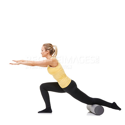 Buy stock photo Woman, foam roller and stretching body in studio with lunge exercise, fitness and yoga workout on white background. Pilates, profile and agile lady balance on tube for training, strong core and power
