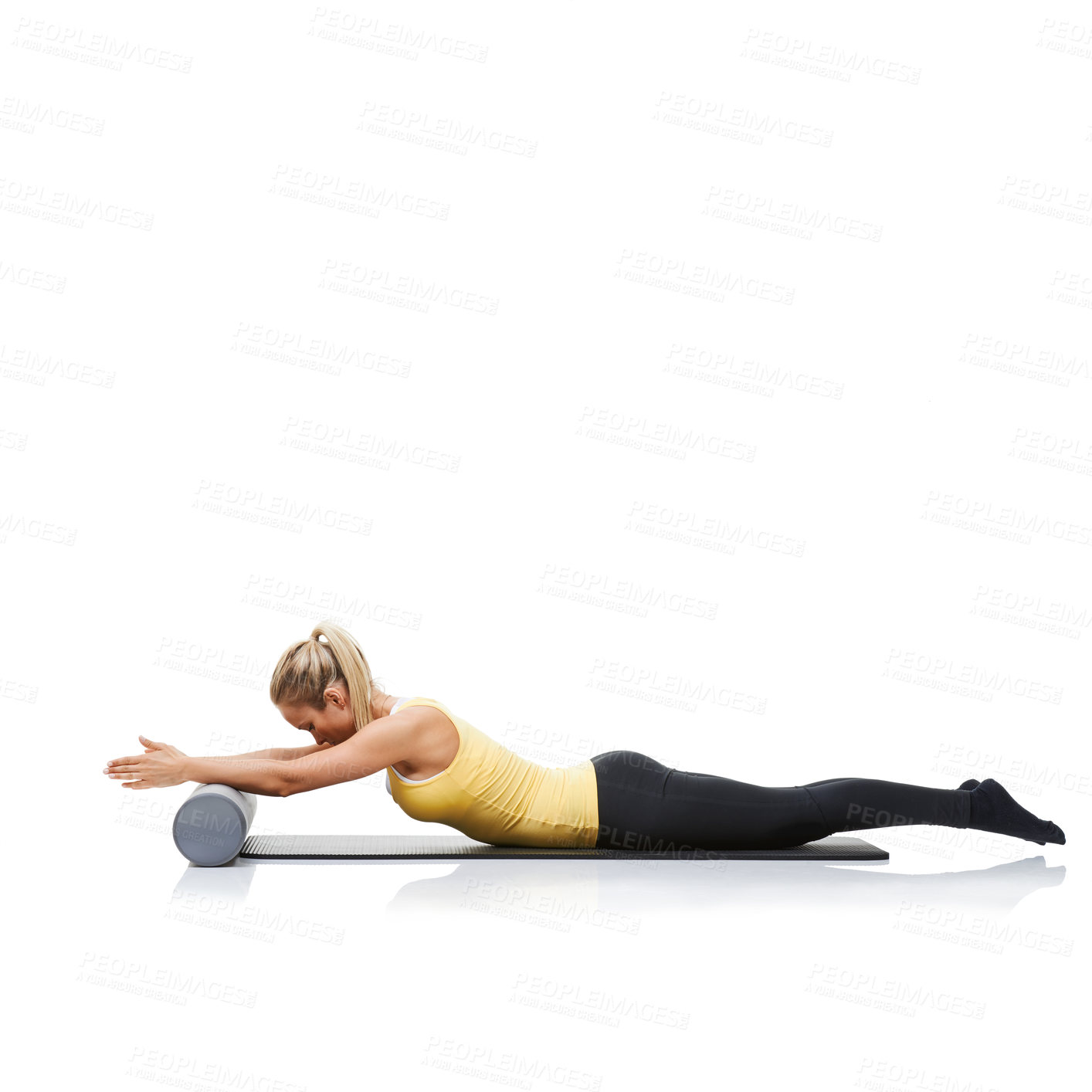 Buy stock photo Fitness, foam roller and woman in a studio for exercise, stretching or gym routine with yoga mat. Stability, balance and young female athlete from Australia with body workout by white background.