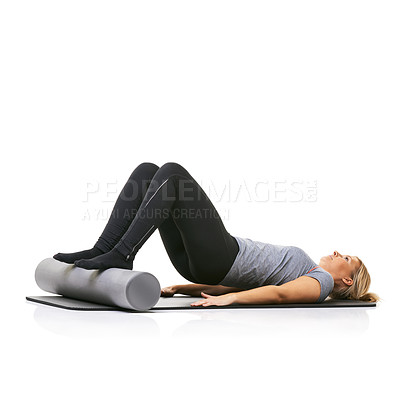 Buy stock photo Core workout, foam roller and studio woman with bridge exercise, activity or wellness for sports performance on floor. Ground, mockup space and girl fitness, training and yoga mat on white background