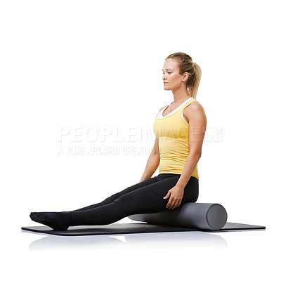 Buy stock photo Studio workout, foam roller and woman with posture exercise, spine rehabilitation or yoga performance challenge. Floor, body wellness training and person sit on fitness equipment on white background
