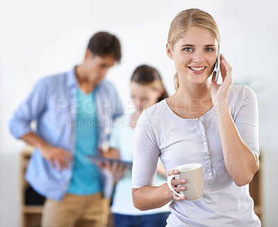 Buy stock photo Business woman, phone call and drinking coffee, portrait and communication on technology in office. Female person, tea and speaking on smartphone in workplace, colleagues and teamwork or internet