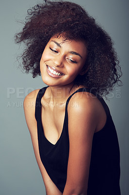 Buy stock photo A smiling young woman with an afro
