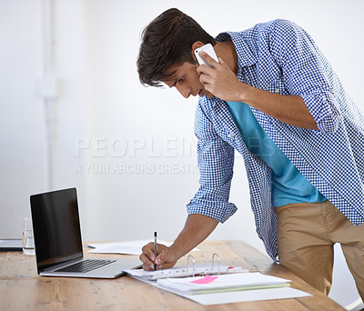Buy stock photo Phone call, writing and business man on laptop for communication, online networking and schedule. Professional, notebook and worker on cellphone for talking, conversation and discussion in office