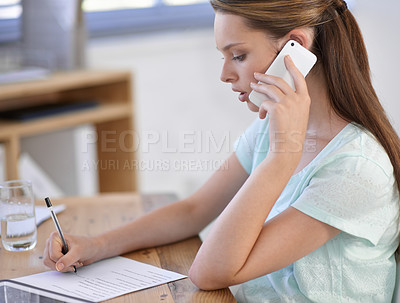 Buy stock photo Business woman, phone call and writing notes in office, planning information or communication in creative agency. Designer talking on cellphone with documents, paperwork and mobile connection at desk