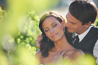 Buy stock photo Love, couple at wedding and marriage in nature together, bonding or romance. Man, woman or bride, groom and people outdoor for care, commitment and connection in relationship, celebration or event