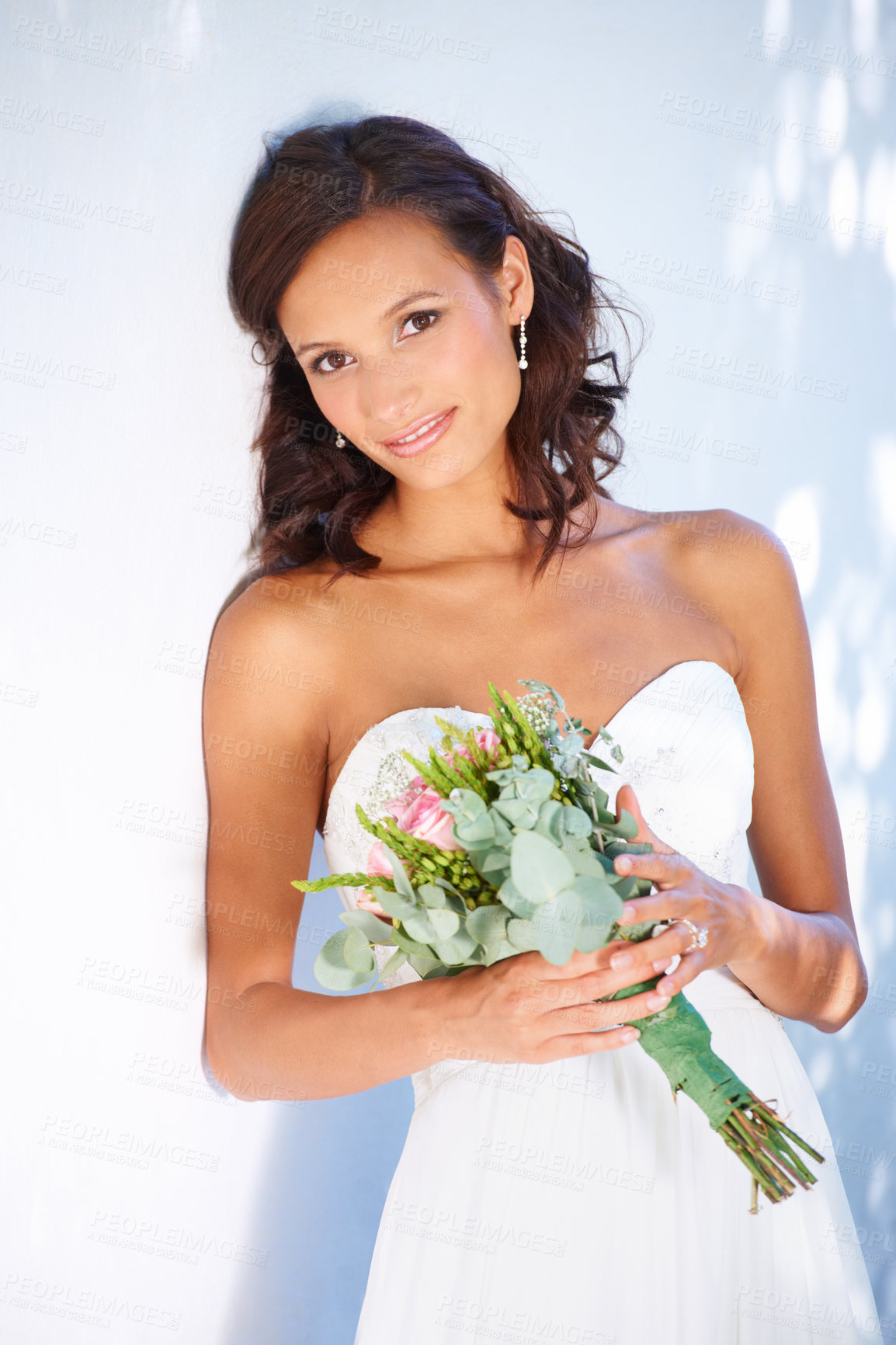 Buy stock photo Young, wedding and bouquet with portrait of woman at venue for love, celebration and engagement. Ceremony, reception and fashion with bride and flowers in dress for event, commitment and marriage