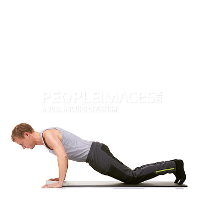Buy stock photo Man, strong fitness or push up exercise on knee in workout, power or mockup in studio on white background. Profile of healthy guy training on mat for core muscles, balance or plank challenge on floor