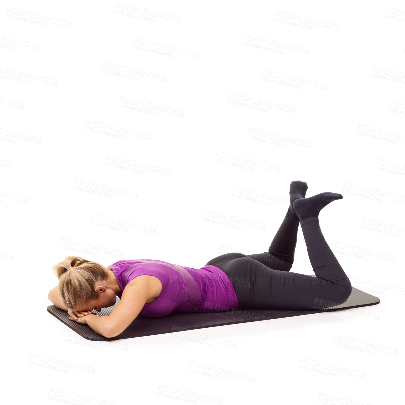 Buy stock photo Yoga, woman and stretching legs on the floor in white background, mock up and studio. Pilates, exercise and person workout on ground with feet raised in air in pose for fitness, health or wellness