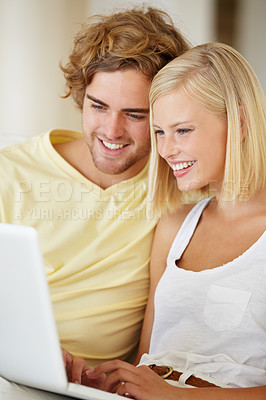 Buy stock photo Happy couple, watch on laptop and relax together for home streaming service, website and movie choice on weekend. Young man and woman reading information on computer or technology for online search 