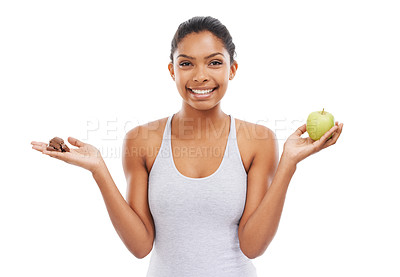 Buy stock photo Apple, chocolate and woman for healthy food choice or offer with food, sugar and diet on a white background. Portrait of happy young person with green fruit, detox and lose weight decision in studio