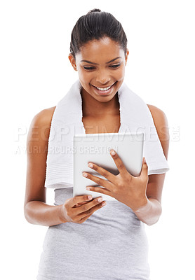 Buy stock photo Fitness, exercise and woman with a tablet, typing and smile isolated on a white studio background. Person, girl and model with internet, connection and online with information, wellness or technology