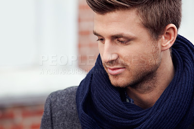 Buy stock photo Closeup shot of a stylishly-dressed young man standing in the street
