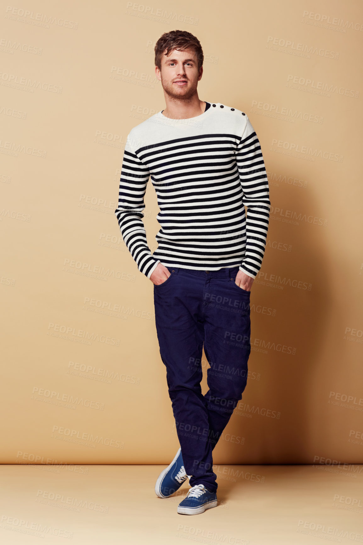 Buy stock photo Full length studio portrait of a stylishly-dressed young man smiling at the camera