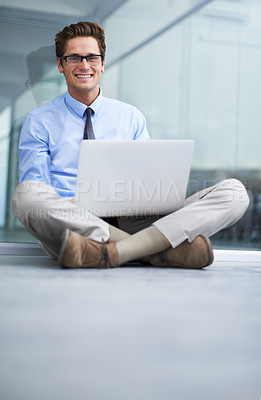 Buy stock photo Laptop, office floor and portrait of happy man, agent or professional consultant typing report, project or email. Research, company workplace and male businessman, banker or person sitting on ground