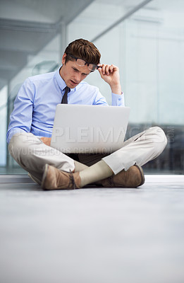 Buy stock photo Laptop problem, office floor and man stress over finance report, feedback statistics or financial loss. Research, stock market crash and confused person reading bad data, business insight or review