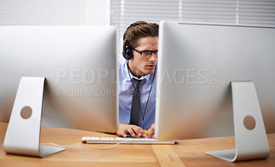 Buy stock photo Computer, office focus and business man typing, reading or working project, research report or statistics analysis. Information technology, cybersecurity and person listening to music while coding