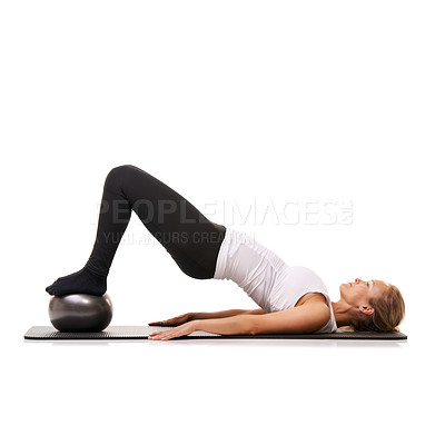 Buy stock photo Workout, stretching and woman on floor with ball for pilates, body fitness care and health in studio. Gym, training and girl on mat with cardio, energy or muscle exercise isolated on white background