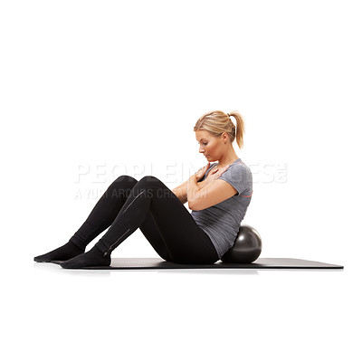 Buy stock photo Fitness, sit up and woman on floor with ball for pilates, body care and health in studio. Gym, training and girl on mat with cardio, energy and muscle workout on ground isolated on white background.