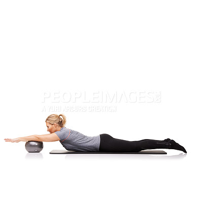 Buy stock photo Stretching arms, pilates and woman on ball in workout, training and healthy body isolated on a white studio background mockup space. Flexible, mat or person on equipment for balance, sport or fitness