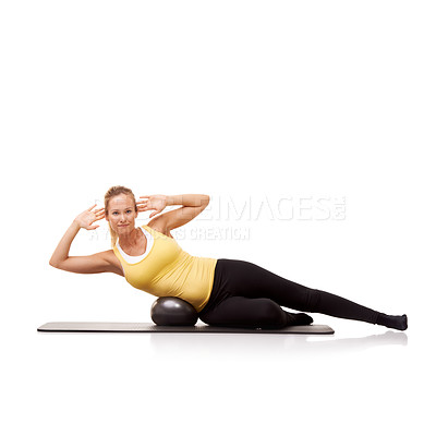 Buy stock photo Woman, portrait and crunch with exercise ball on side for abductor workout, mockup space or white background. Female person, face and equipment in studio for training, balance or abdomen wellness