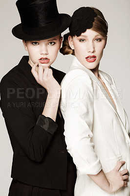 Buy stock photo Women, fashion and models for portrait, pose and makeup with vintage clothes and studio background. Classic, retro and classy with glamour, stylish and jacket for lady, elegance or timeless outfit