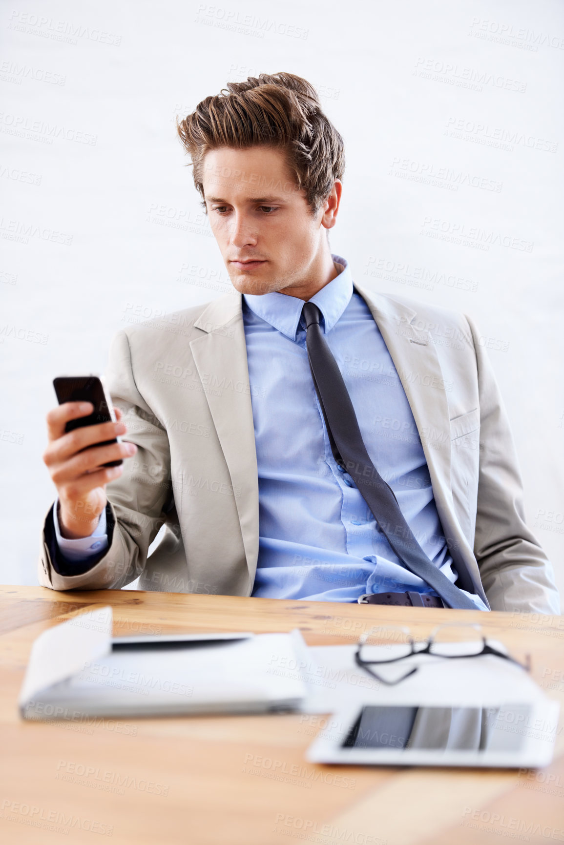 Buy stock photo Businessman, phone and networking or email in office, connection and contact for company. Male person, professional and communication or mobile application, technology and smartphone for discussion