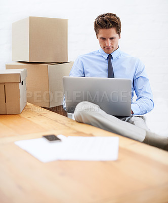 Buy stock photo Business man, shipping boxes and typing on laptop, entrepreneur and online logistics for courier. Male person, professional and delivery for company distribution, package and technology or internet