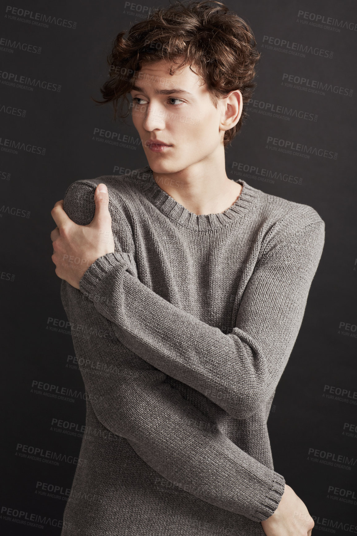 Buy stock photo Serious, fashion and man in sweater thinking in studio isolated on a a grey background. Model, idea and dream in style, trendy clothes and young, handsome or casual insecure person on a backdrop