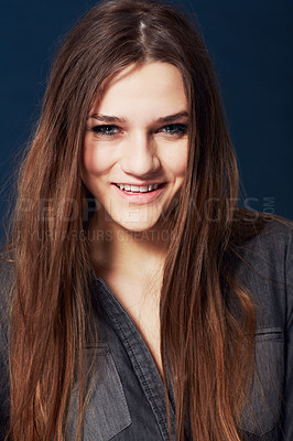 Buy stock photo Portrait, beauty and smile with a natural woman in studio on a dark background for wellness at the salon. Face, hair or skincare and a confident young model looking happy with makeup or cosmetics