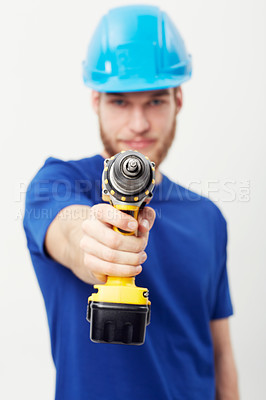 Buy stock photo Construction worker man, drill and studio portrait with hand for maintenance by white background. Person, employee or small business owner with power tools, helmet and job at repair services company
