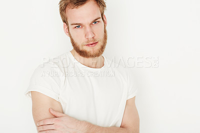 Buy stock photo Man, portrait and confident or fashion in studio with casual style, trendy outfit and calm expression. Person, face and relaxing, t-shirt and satisfaction with peace and pride on white background