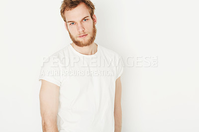 Buy stock photo Portrait of a young man wearing a white t-shirt