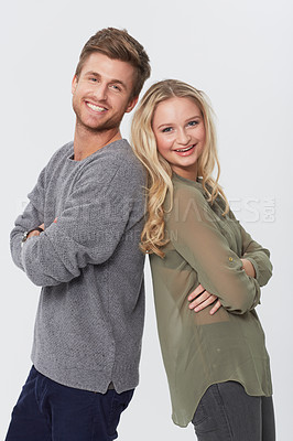 Buy stock photo Portrait, smile or couple with arms crossed, love or pride in romantic relationship isolated on a white studio background. Happy man, woman or confidence together for fashion, trendy clothes or style