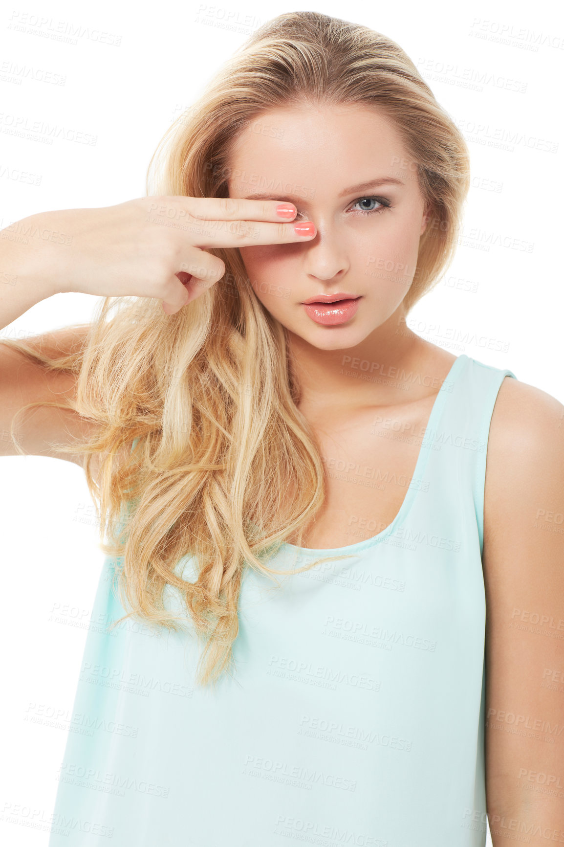 Buy stock photo A pretty young woman snipping her fingers over her eyes while isolated on white