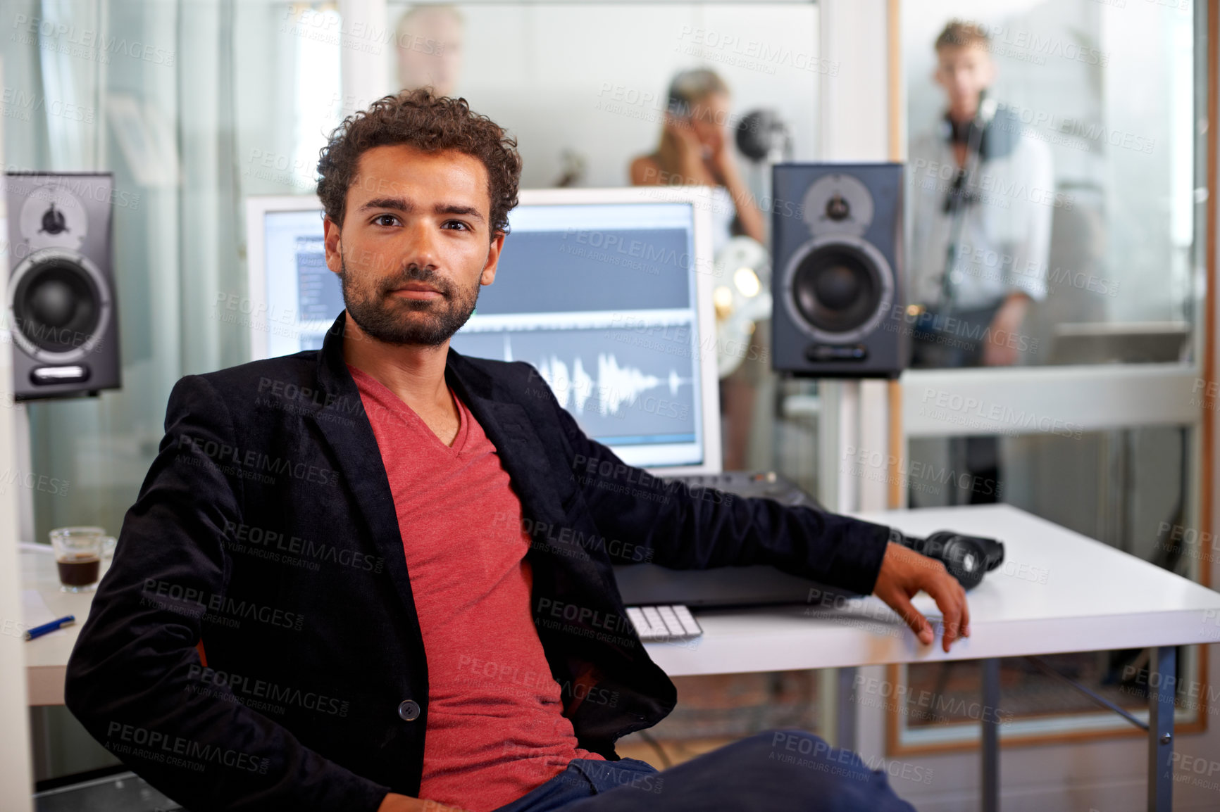 Buy stock photo Portrait, media and a man producer in a recording studio mixing audio with a sound desk. Computer, tech or music with a serious young DJ or engineer creating a track for production or entertainment