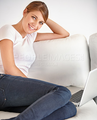Buy stock photo Woman, portrait and smile with laptop on sofa to watch movies, digital subscription and streaming multimedia at home. Computer, online shopping and relax to update blog, social network and internet 