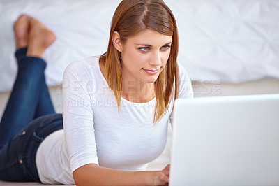 Buy stock photo Woman, remote work and relax on floor with laptop to update blog post, social media and digital news subscription at home. Freelancer typing on computer for online shopping, editing email or research