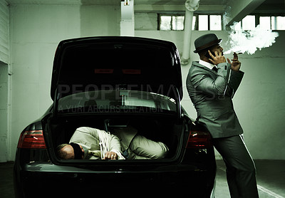 Buy stock photo Phone call, smoking and criminal with hostage in trunk for negotiation, kidnapping ransom and crime. Mafia, gangster and business person in boot for abduction, robbery and money in parking lot