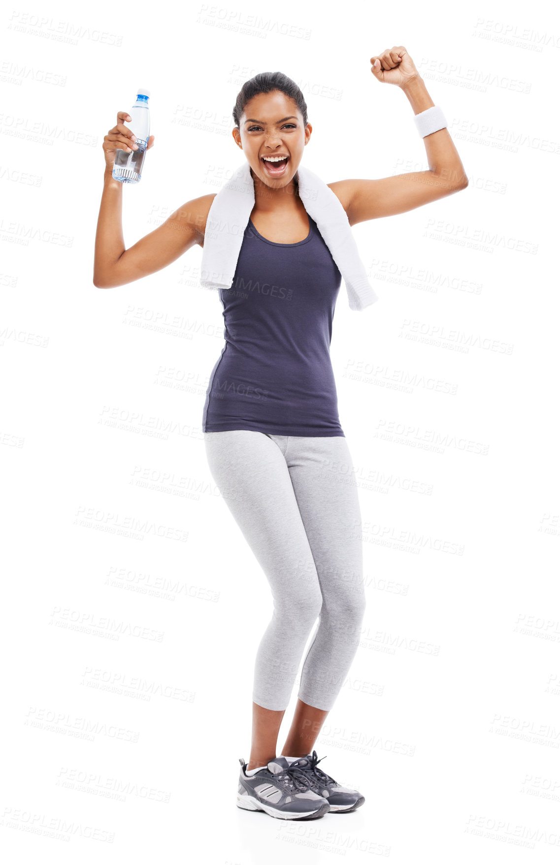 Buy stock photo A young woman holding a bottle of water and flexing her biceps after an energizing workout