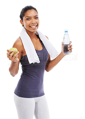 Buy stock photo Portrait, water bottle and woman with apple for healthy food, nutrition or hydration after fitness, exercise or workout. Studio, liquid and thirsty African person with diet fruits on white background